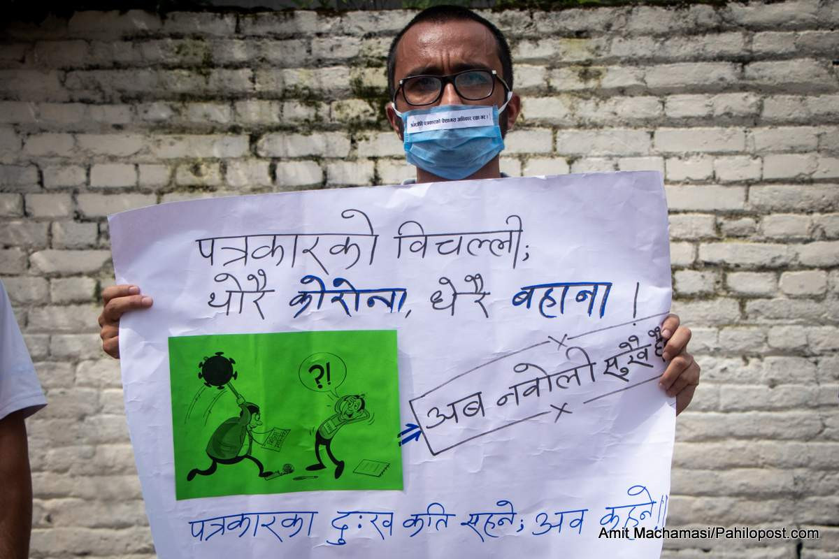 Journalist Laxman Karki @ FNJ Protest in covid 19.jpg